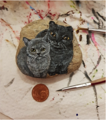 Miniaturmalerei Katzen auf einem Stein